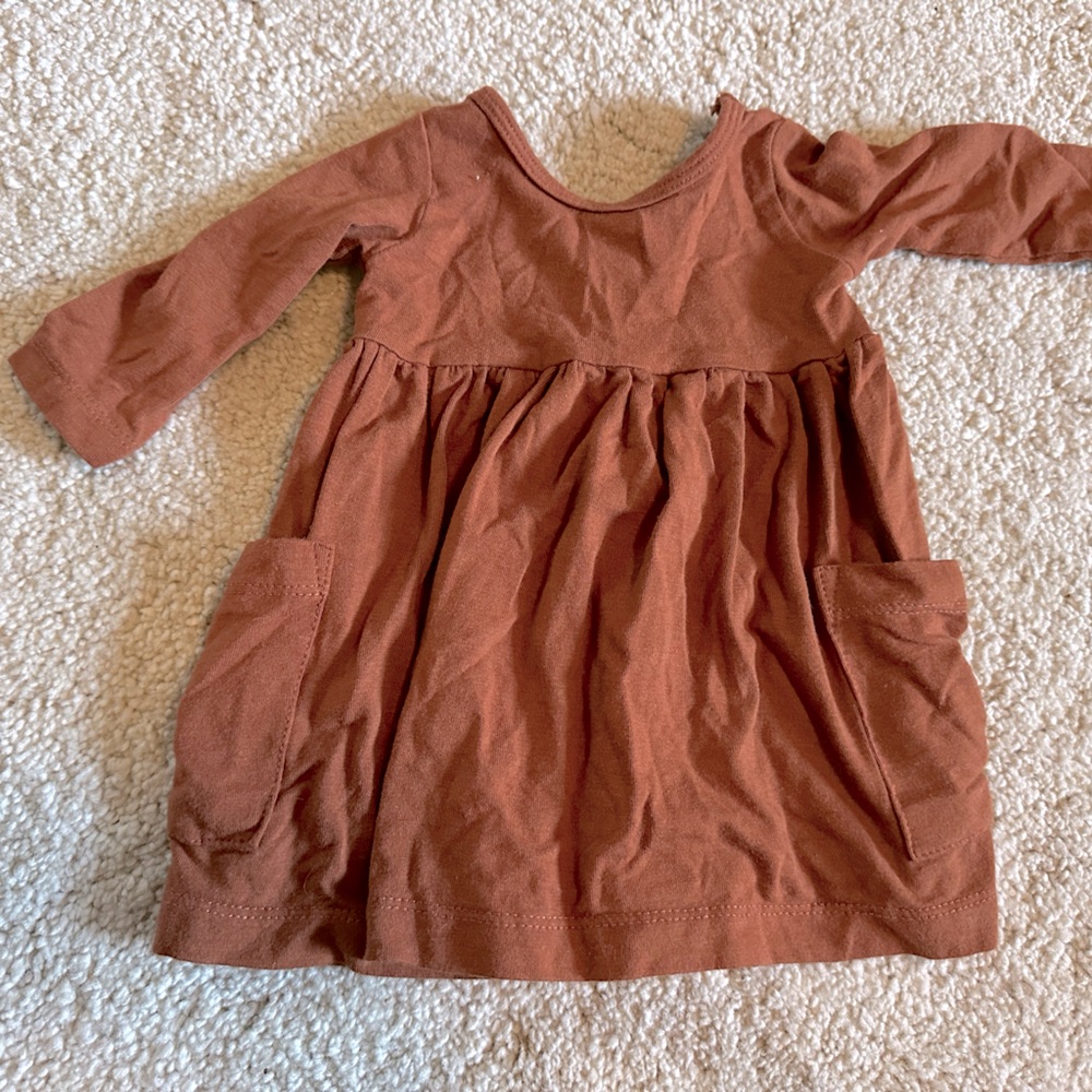 Baby sprouts organic cotton burnt orange dress. Softest fabric